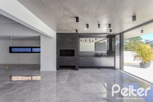 Casa em Condomínio à venda com 392m², 4 dormitórios, 4 suítes, 4 vagas, no bairro Terra Ville em PORTO ALEGRE