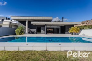 Casa em Condomínio à venda com 392m², 4 dormitórios, 4 suítes, 4 vagas, no bairro Terra Ville em PORTO ALEGRE
