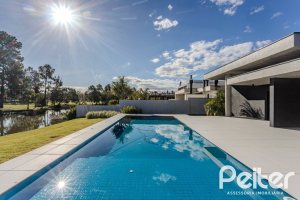 Casa em Condomínio à venda com 392m², 4 dormitórios, 4 suítes, 4 vagas, no bairro Terra Ville em PORTO ALEGRE