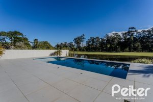 Casa em Condomínio à venda com 392m², 4 dormitórios, 4 suítes, 4 vagas, no bairro Terra Ville em PORTO ALEGRE