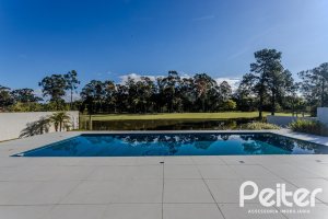 Casa em Condomínio à venda com 392m², 4 dormitórios, 4 suítes, 4 vagas, no bairro Terra Ville em PORTO ALEGRE