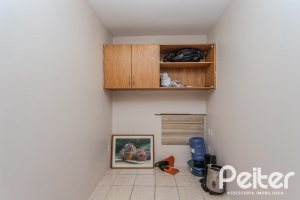 Casa à venda com 396m², 4 dormitórios, 1 suíte, 5 vagas, no bairro Tristeza em Porto Alegre