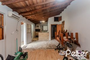Casa à venda com 396m², 4 dormitórios, 1 suíte, 5 vagas, no bairro Tristeza em Porto Alegre