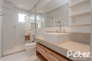 Casa à venda com 152m², 3 dormitórios, 1 suíte, 2 vagas, no bairro Tristeza em Porto Alegre