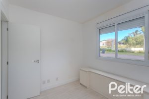 Apartamento à venda com 57m², 2 dormitórios, 1 suíte, 1 vaga, no bairro Vila Nova em PORTO ALEGRE