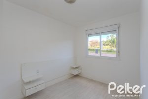 Apartamento à venda com 57m², 2 dormitórios, 1 suíte, 1 vaga, no bairro Vila Nova em PORTO ALEGRE