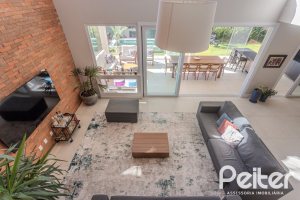 Casa em Condomínio à venda com 340m², 3 dormitórios, 3 suítes, 4 vagas, no bairro Alphaville em PORTO ALEGRE
