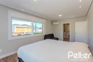 Casa em Condomínio à venda com 340m², 3 dormitórios, 3 suítes, 4 vagas, no bairro Alphaville em PORTO ALEGRE