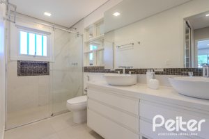 Casa em Condomínio à venda com 340m², 3 dormitórios, 3 suítes, 4 vagas, no bairro Alphaville em PORTO ALEGRE