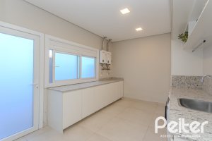 Casa em Condomínio à venda com 340m², 3 dormitórios, 3 suítes, 4 vagas, no bairro Alphaville em PORTO ALEGRE