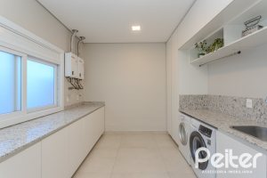 Casa em Condomínio à venda com 340m², 3 dormitórios, 3 suítes, 4 vagas, no bairro Alphaville em PORTO ALEGRE