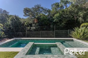 Casa em Condomínio à venda com 340m², 3 dormitórios, 3 suítes, 4 vagas, no bairro Alphaville em PORTO ALEGRE