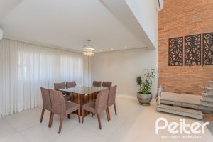 Casa em Condomínio à venda com 340m², 3 dormitórios, 3 suítes, 4 vagas, no bairro Alphaville em PORTO ALEGRE