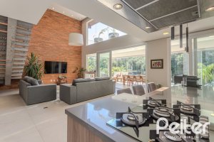 Casa em Condomínio à venda com 340m², 3 dormitórios, 3 suítes, 4 vagas, no bairro Alphaville em PORTO ALEGRE
