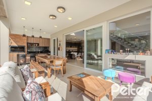 Casa em Condomínio à venda com 340m², 3 dormitórios, 3 suítes, 4 vagas, no bairro Alphaville em PORTO ALEGRE
