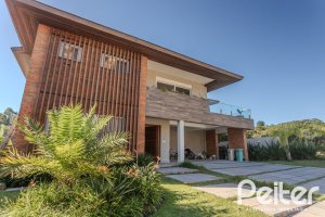 Casa em Condomínio à venda com 340m², 3 dormitórios, 3 suítes, 4 vagas, no bairro Alphaville em PORTO ALEGRE