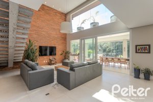 Casa em Condomínio à venda com 340m², 3 dormitórios, 3 suítes, 4 vagas, no bairro Alphaville em PORTO ALEGRE
