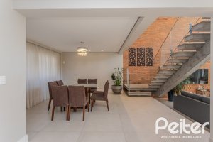 Casa em Condomínio à venda com 340m², 3 dormitórios, 3 suítes, 4 vagas, no bairro Alphaville em PORTO ALEGRE