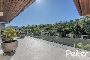 Casa em Condomínio à venda com 340m², 3 dormitórios, 3 suítes, 4 vagas, no bairro Alphaville em PORTO ALEGRE