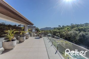 Casa em Condomínio à venda com 340m², 3 dormitórios, 3 suítes, 4 vagas, no bairro Alphaville em PORTO ALEGRE