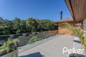 Casa em Condomínio à venda com 340m², 3 dormitórios, 3 suítes, 4 vagas, no bairro Alphaville em PORTO ALEGRE