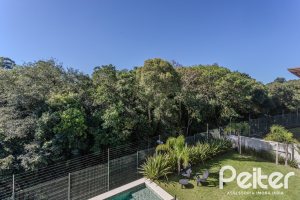 Casa em Condomínio à venda com 340m², 3 dormitórios, 3 suítes, 4 vagas, no bairro Alphaville em PORTO ALEGRE