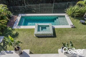Casa em Condomínio à venda com 340m², 3 dormitórios, 3 suítes, 4 vagas, no bairro Alphaville em PORTO ALEGRE