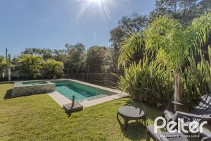 Casa em Condomínio à venda com 340m², 3 dormitórios, 3 suítes, 4 vagas, no bairro Alphaville em PORTO ALEGRE
