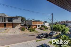 Casa em Condomínio à venda com 340m², 3 dormitórios, 3 suítes, 4 vagas, no bairro Alphaville em PORTO ALEGRE