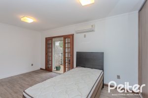 Casa em Condomínio à venda com 159m², 3 dormitórios, 1 suíte, 2 vagas, no bairro Tristeza em PORTO ALEGRE