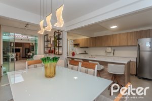 Casa em Condomínio à venda com 159m², 3 dormitórios, 1 suíte, 2 vagas, no bairro Tristeza em PORTO ALEGRE