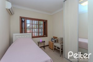 Casa em Condomínio à venda com 159m², 3 dormitórios, 1 suíte, 2 vagas, no bairro Tristeza em PORTO ALEGRE