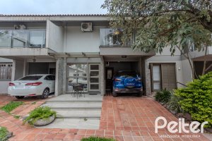 Casa em Condomínio à venda com 159m², 3 dormitórios, 1 suíte, 2 vagas, no bairro Tristeza em PORTO ALEGRE