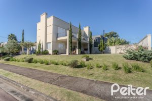 Casa em Condomínio à venda com 441m², 4 dormitórios, 4 suítes, 3 vagas, no bairro Alphaville em PORTO ALEGRE
