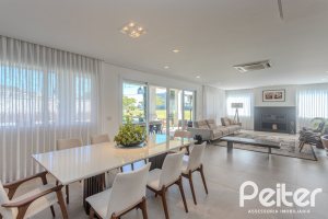 Casa em Condomínio à venda com 441m², 4 dormitórios, 4 suítes, 3 vagas, no bairro Alphaville em PORTO ALEGRE