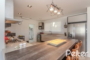 Casa em Condomínio à venda com 441m², 4 dormitórios, 4 suítes, 3 vagas, no bairro Alphaville em PORTO ALEGRE