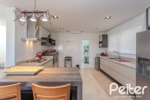 Casa em Condomínio à venda com 441m², 4 dormitórios, 4 suítes, 3 vagas, no bairro Alphaville em PORTO ALEGRE