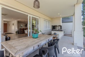 Casa em Condomínio à venda com 441m², 4 dormitórios, 4 suítes, 3 vagas, no bairro Alphaville em PORTO ALEGRE