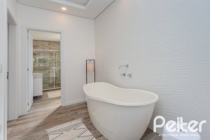Casa em Condomínio à venda com 441m², 4 dormitórios, 4 suítes, 3 vagas, no bairro Alphaville em PORTO ALEGRE