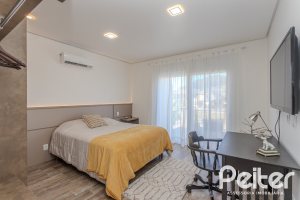 Casa em Condomínio à venda com 441m², 4 dormitórios, 4 suítes, 3 vagas, no bairro Alphaville em PORTO ALEGRE
