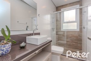 Casa em Condomínio à venda com 441m², 4 dormitórios, 4 suítes, 3 vagas, no bairro Alphaville em PORTO ALEGRE