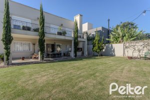 Casa em Condomínio à venda com 441m², 4 dormitórios, 4 suítes, 3 vagas, no bairro Alphaville em PORTO ALEGRE