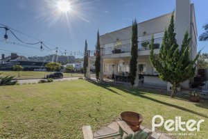 Casa em Condomínio à venda com 441m², 4 dormitórios, 4 suítes, 3 vagas, no bairro Alphaville em PORTO ALEGRE