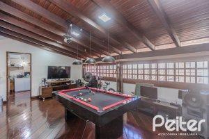 Casa à venda com 359m², 3 dormitórios, 1 suíte, 3 vagas, no bairro Vila Assunção em Porto Alegre