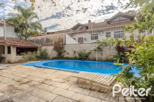 Casa à venda com 248m², 3 dormitórios, 1 suíte, 4 vagas, no bairro Ipanema em Porto Alegre