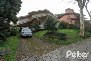 Casa em Condomínio à venda com 363m², 3 dormitórios, 2 suítes, 4 vagas, no bairro Cavalhada em PORTO ALEGRE