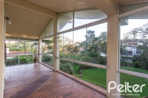 Casa em Condomínio à venda com 363m², 3 dormitórios, 2 suítes, 4 vagas, no bairro Cavalhada em PORTO ALEGRE