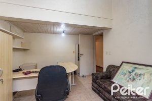Casa em Condomínio à venda com 363m², 3 dormitórios, 2 suítes, 4 vagas, no bairro Cavalhada em PORTO ALEGRE