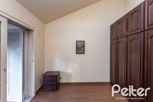 Casa em Condomínio à venda com 363m², 3 dormitórios, 2 suítes, 4 vagas, no bairro Cavalhada em PORTO ALEGRE
