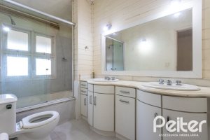 Casa em Condomínio à venda com 363m², 3 dormitórios, 2 suítes, 4 vagas, no bairro Cavalhada em PORTO ALEGRE